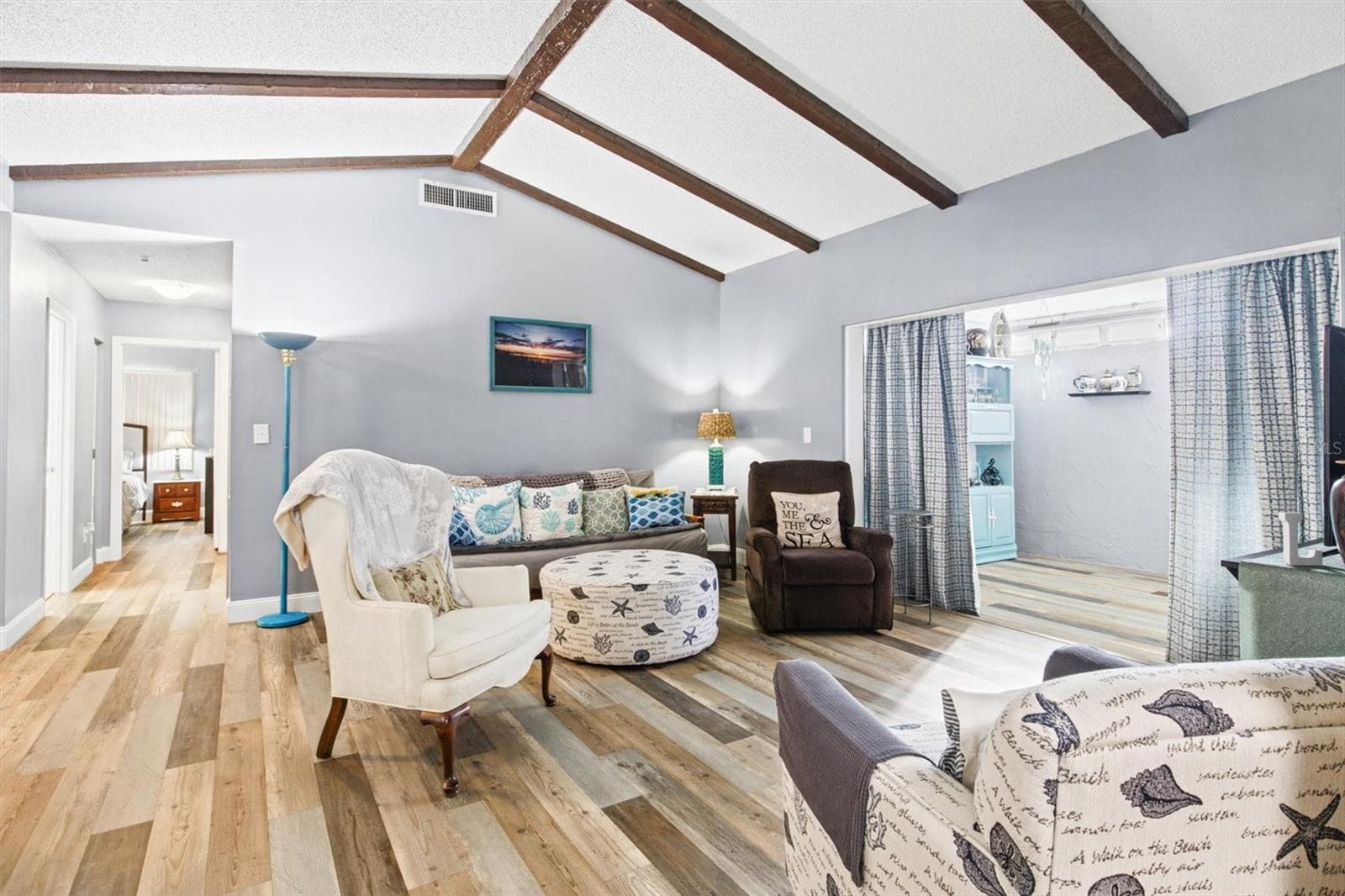 Living Room - Vaulted Ceilings with Wood Beams - 273 MARIPOSA ST, WINTER HAVEN