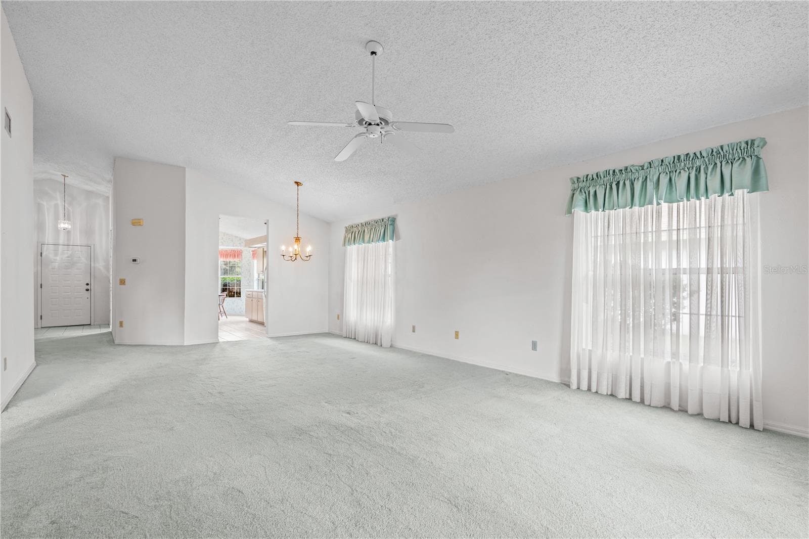 Open Living & Dining Area - 245 GLENBRIAR CIR, DAYTONA BEACH