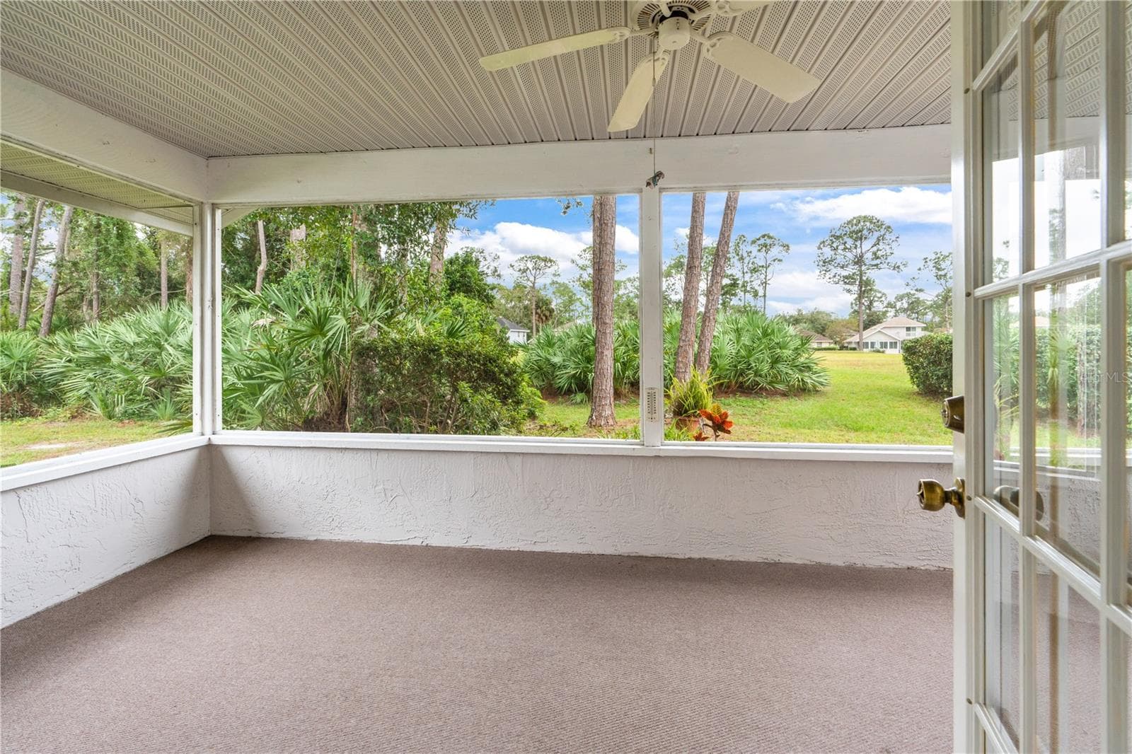 Screened Porch Overlooks Backyard - 245 GLENBRIAR CIR, DAYTONA BEACH