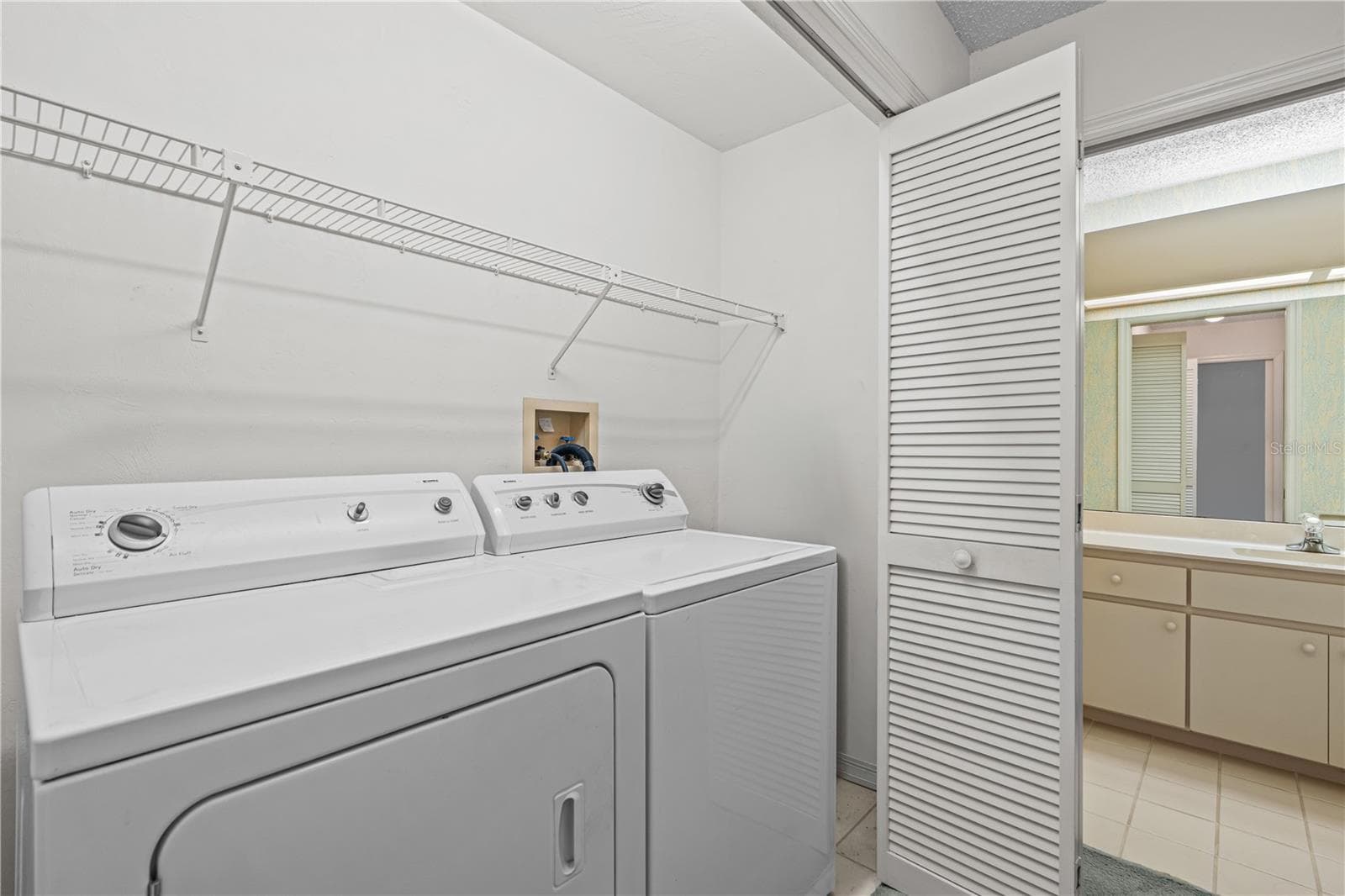 Laundry with Extra Storage - 245 GLENBRIAR CIR, DAYTONA BEACH