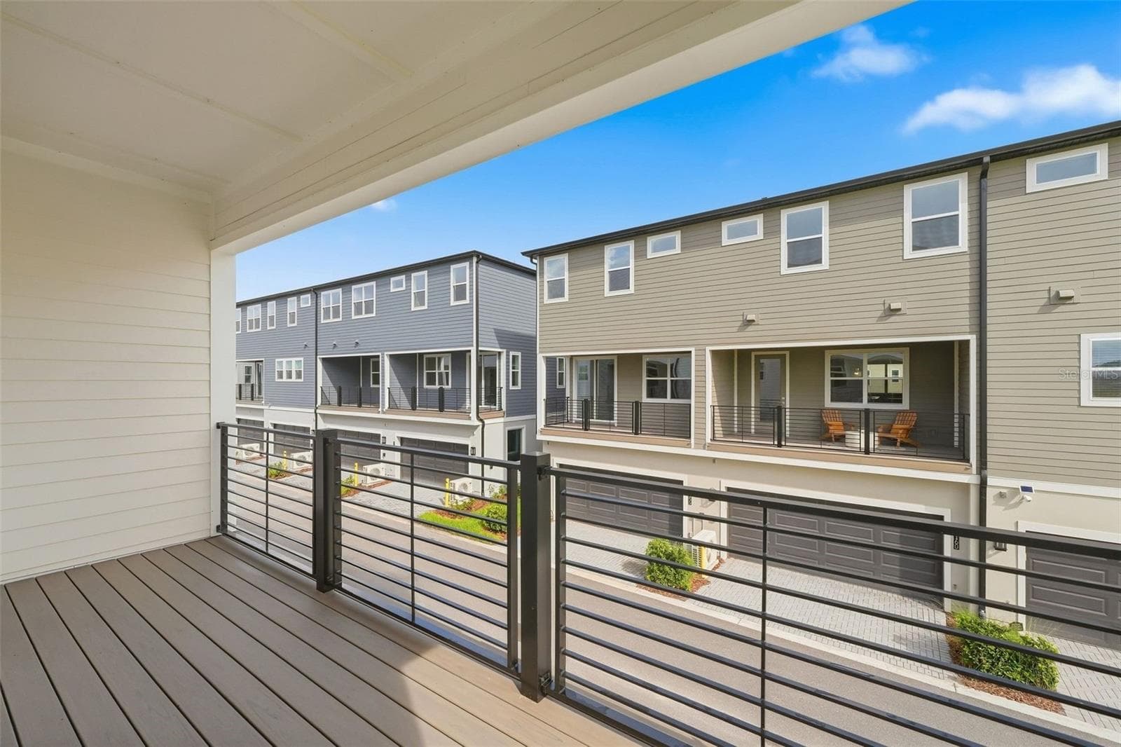 large balcony with Trex flooring - 9317 LUMINARY BLVD, ORLANDO