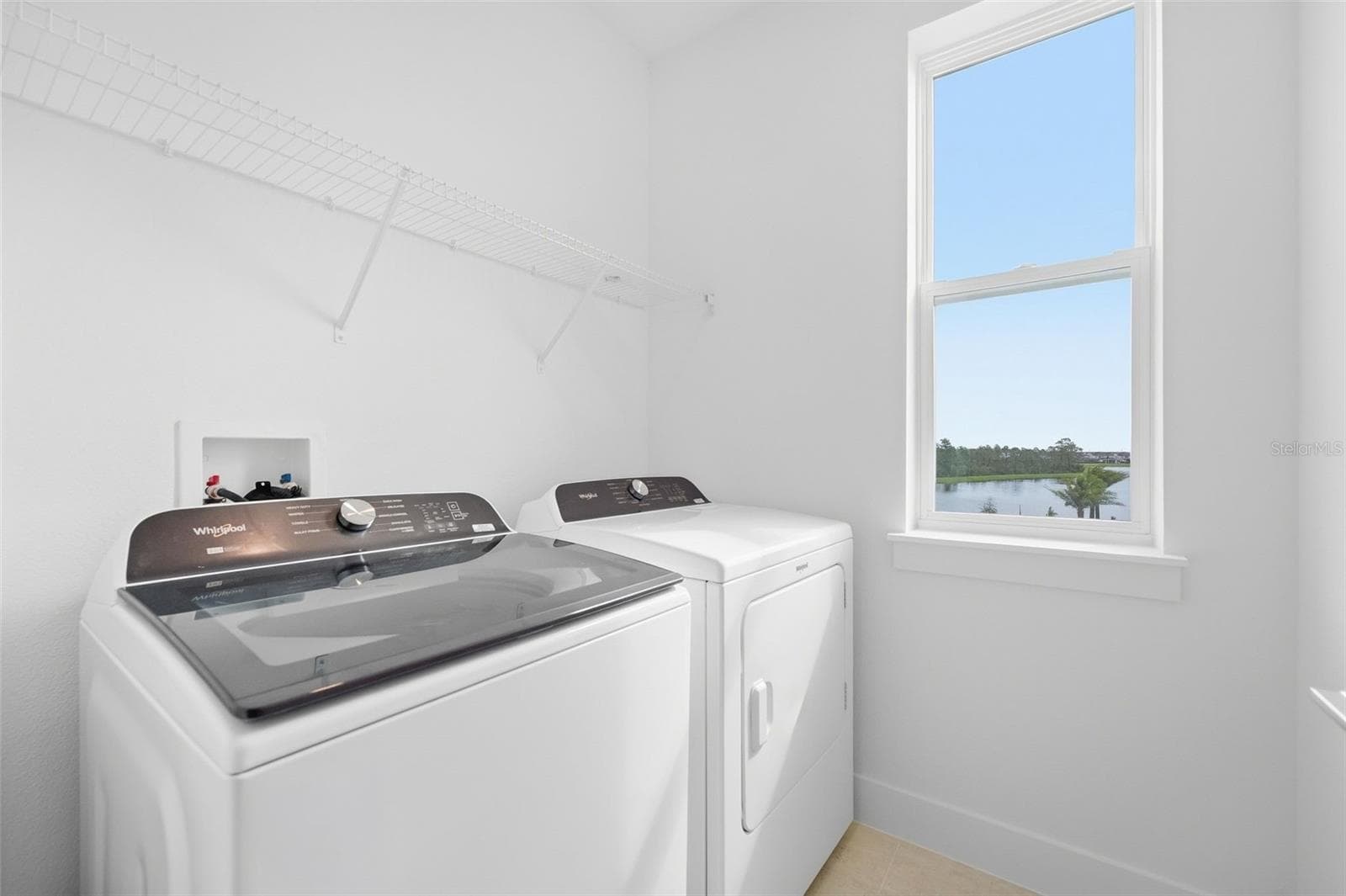 Laundry room with washer and dryer included - 9317 LUMINARY BLVD, ORLANDO