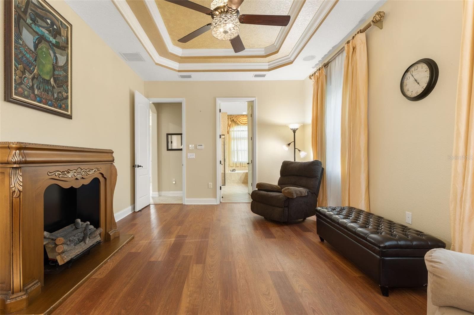 Another perspective highlights the generous floor space and convenient access to the adjoining primary bathroom. - 25 EMERALD LAKE CT, PALM COAST