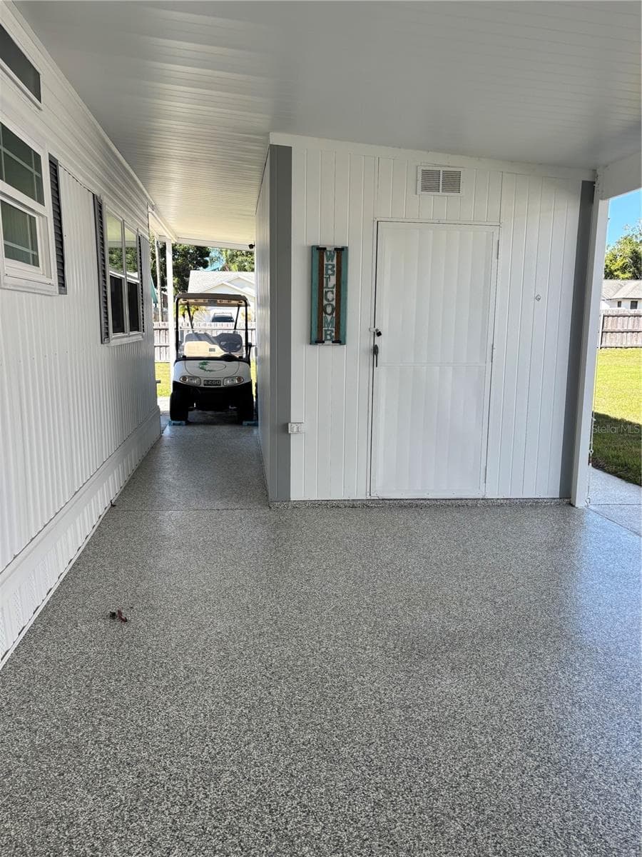 Carport....utility closet - 20 MOUNTAIN LAUREL DR, PALM HARBOR