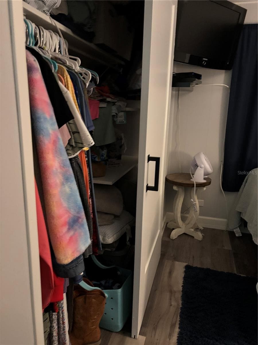 Primary bedroom walk in closet - 20 MOUNTAIN LAUREL DR, PALM HARBOR