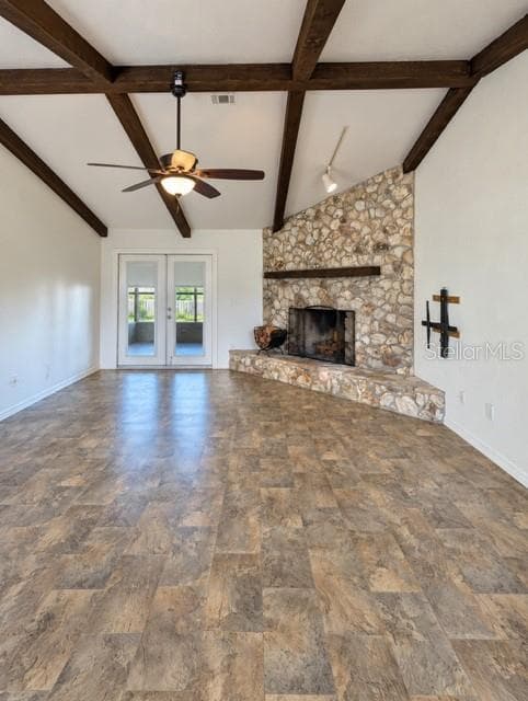 Spacious family room with fireplace and french doors - 3645 SE 48 ST, OCALA