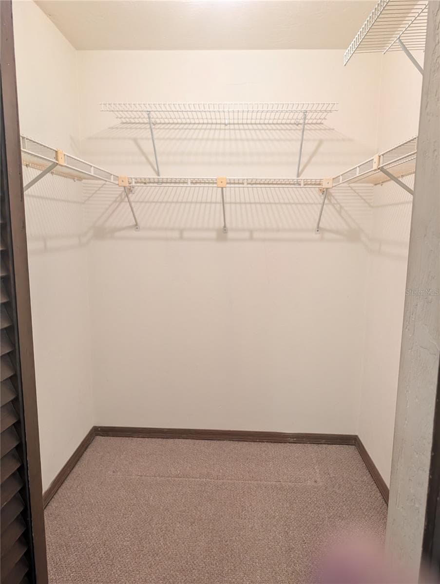 Primary bedroom walk in closet - 3645 SE 48 ST, OCALA