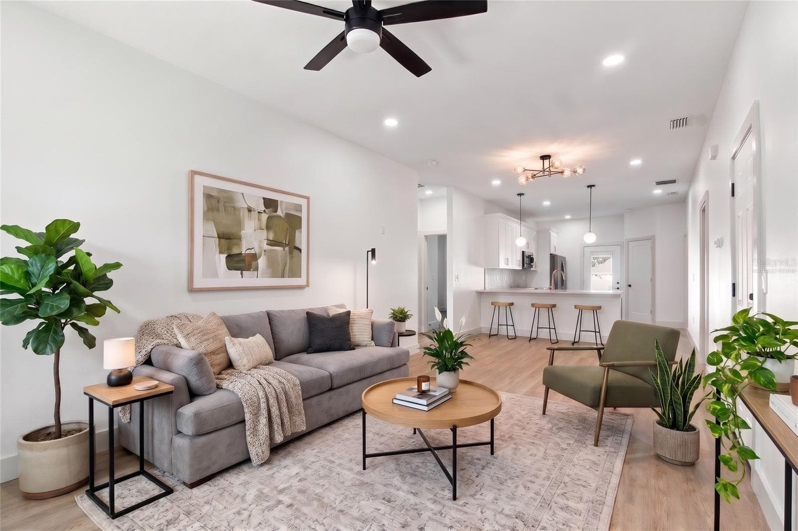 virtually staged living room - 8514 N 12TH ST, TAMPA