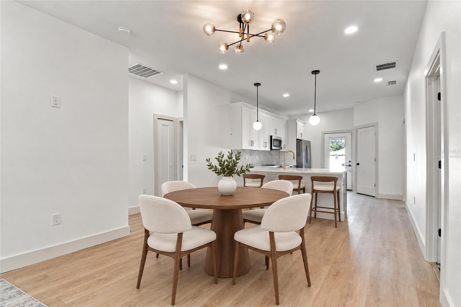 virtually staged dining room - 8514 N 12TH ST, TAMPA