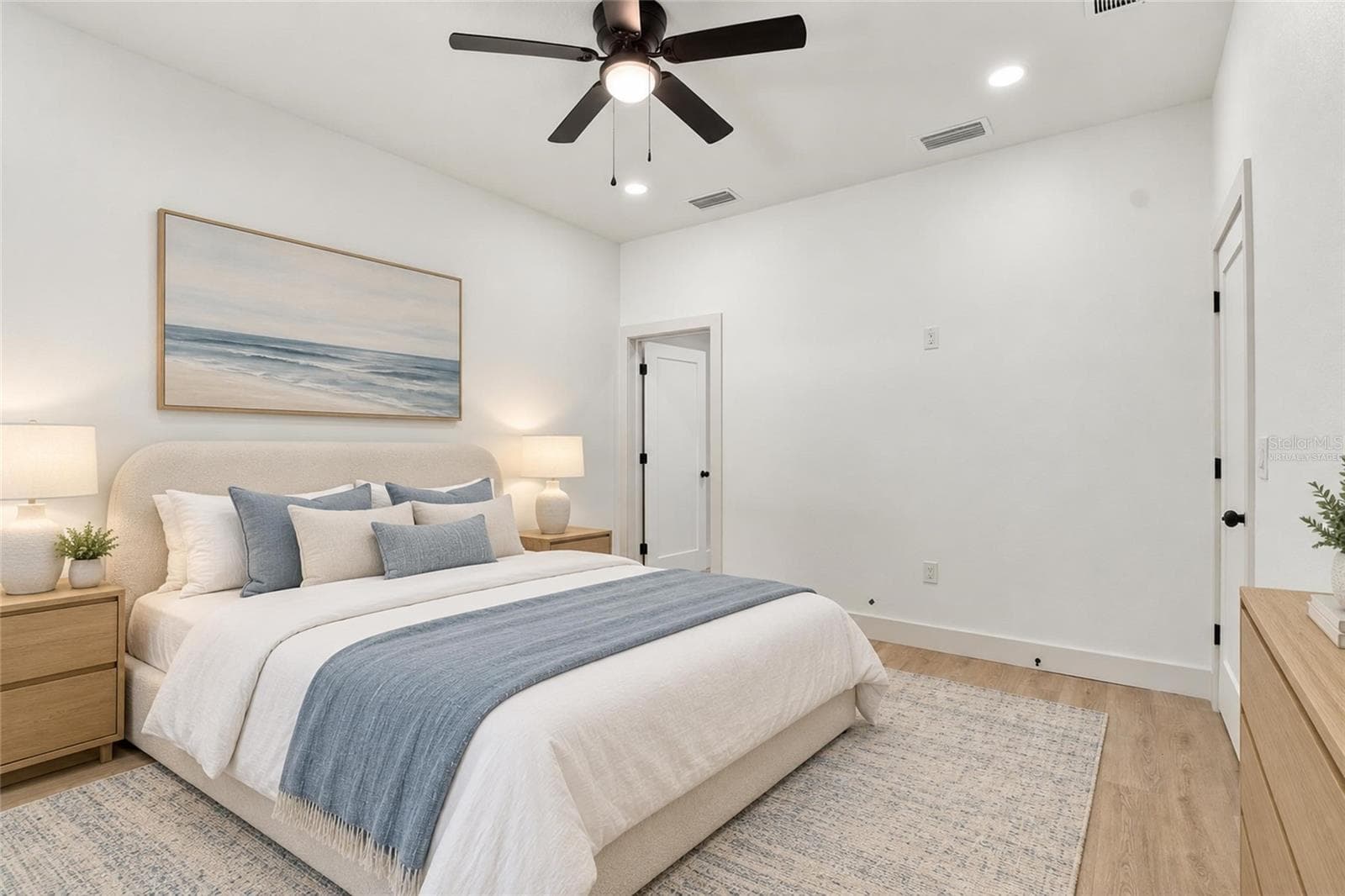 virtually staged primary bedroom - 8514 N 12TH ST, TAMPA