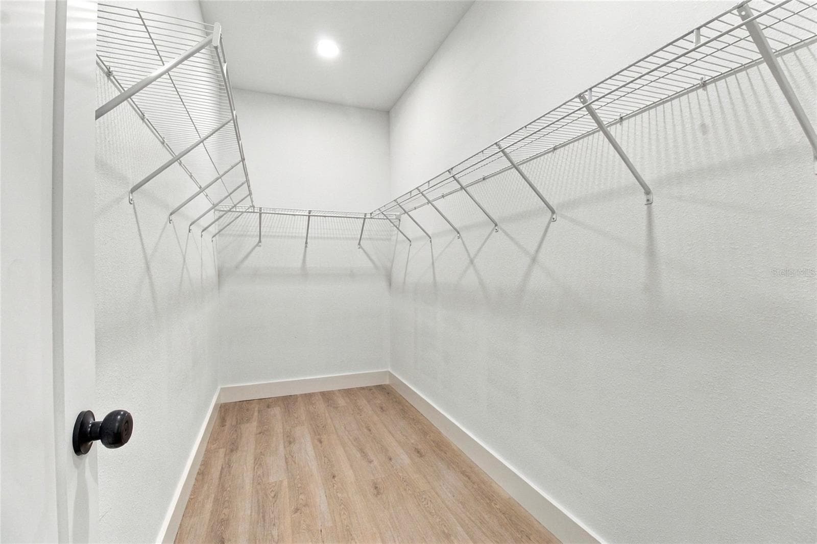 primary bedroom walk-in closet - 8514 N 12TH ST, TAMPA