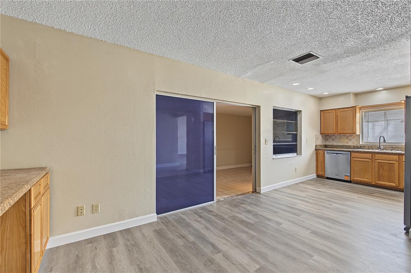 Patio off to the side of the kitchen - 2729 FOXFIRE CT #C, CLEARWATER