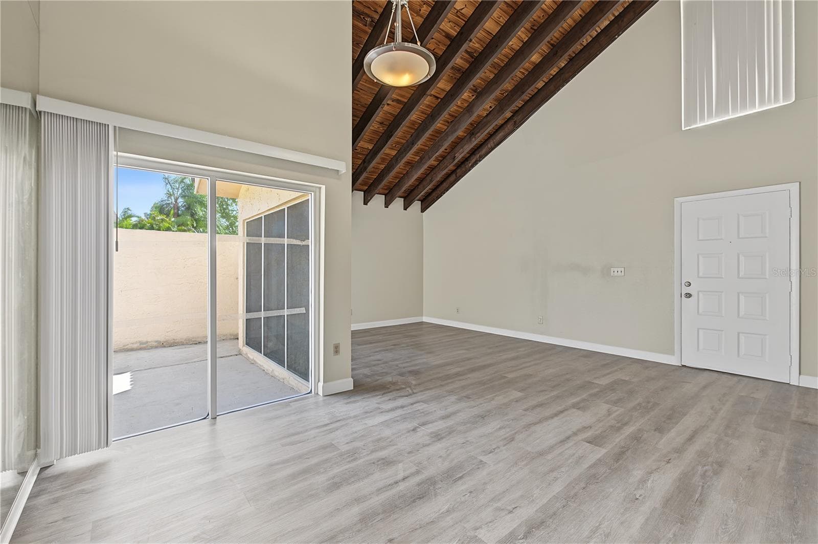 Dining Room, Private walled outside patio to the right, lots of sunlight. - 2729 FOXFIRE CT #C, CLEARWATER