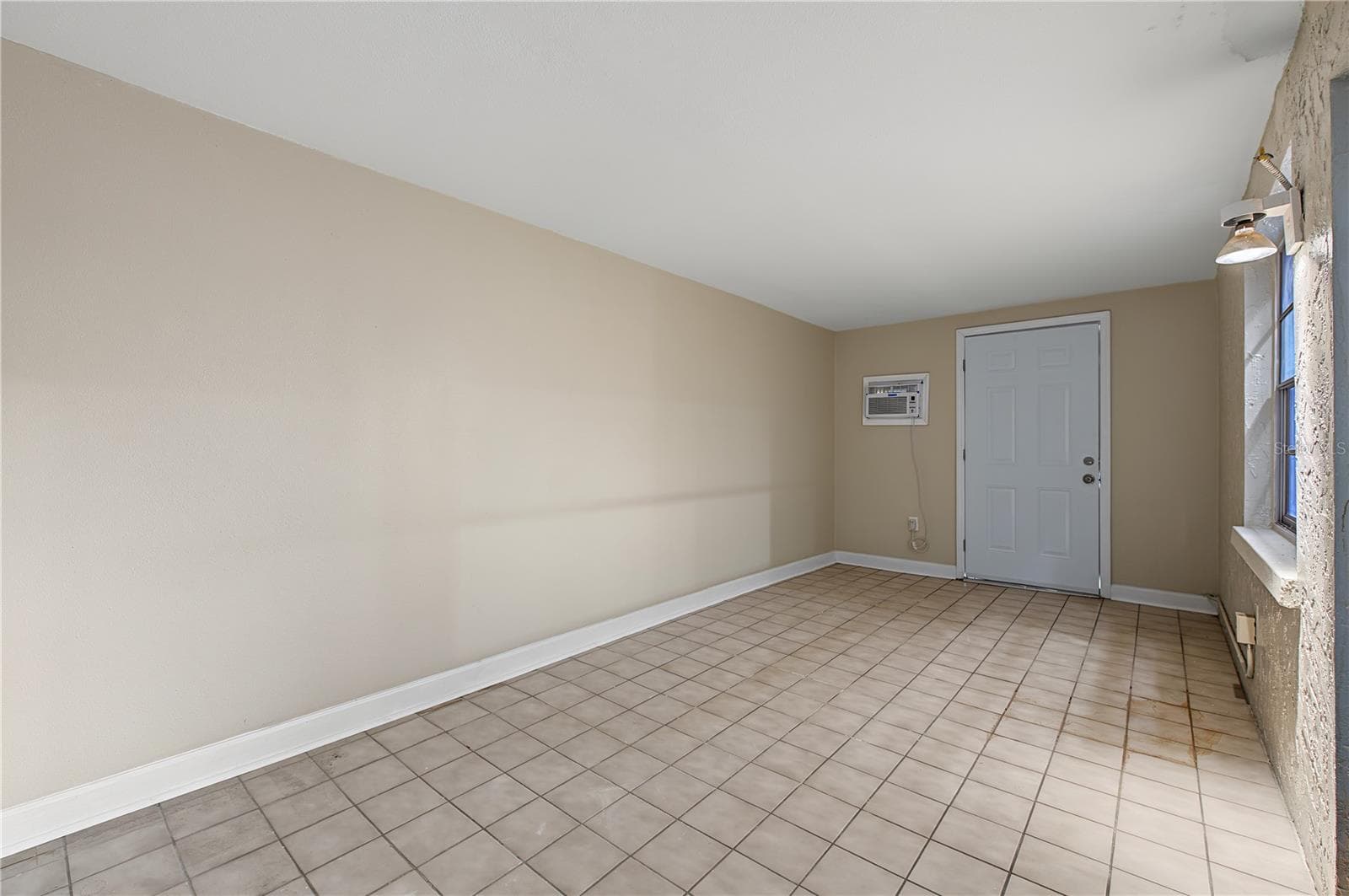Side patio off of the kitchen - 2729 FOXFIRE CT #C, CLEARWATER