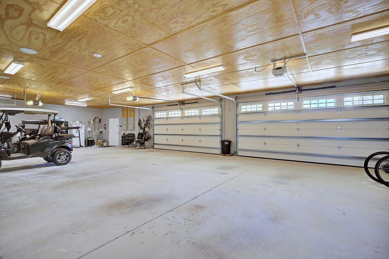 4 Car garage 54'4"x28'10" - 2851 VILLAGE GREEN CT, AVON PARK