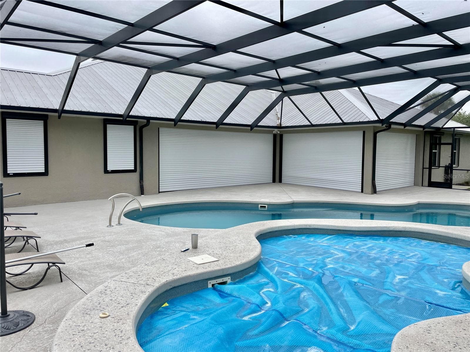 Hurricane shutters - 2851 VILLAGE GREEN CT, AVON PARK