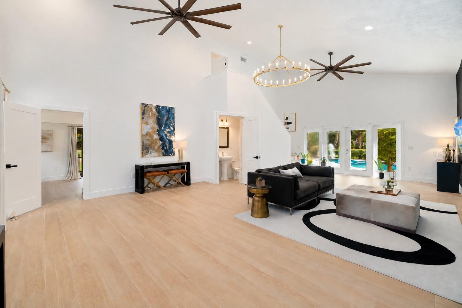 virtually renovated half-bath (Guest Bath) with Bigger Fans in Ceiling Image - 403 LONGBOW TRL, OSPREY