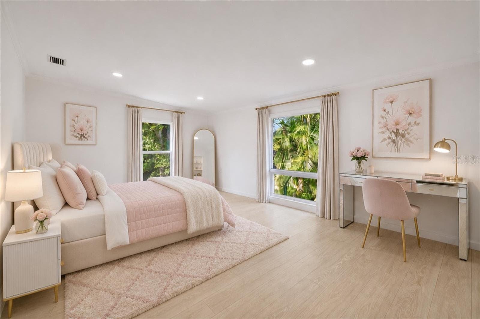 VIRTUALLY STAGED – Spacious upstairs primary bedroom shown with conceptual furnishings to illustrate the room’s generous scale and possibilities. - 403 LONGBOW TRL, OSPREY
