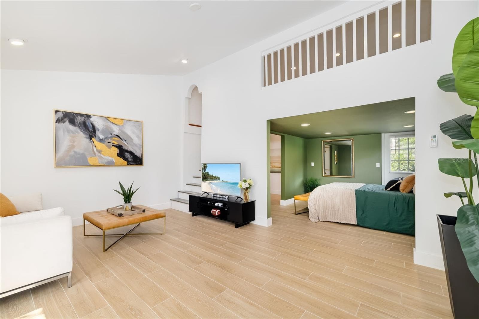 Spacious additional living/family room near the garage creates a versatile retreat for guests, extended family, multigenerational living or a private home office. - 403 LONGBOW TRL, OSPREY