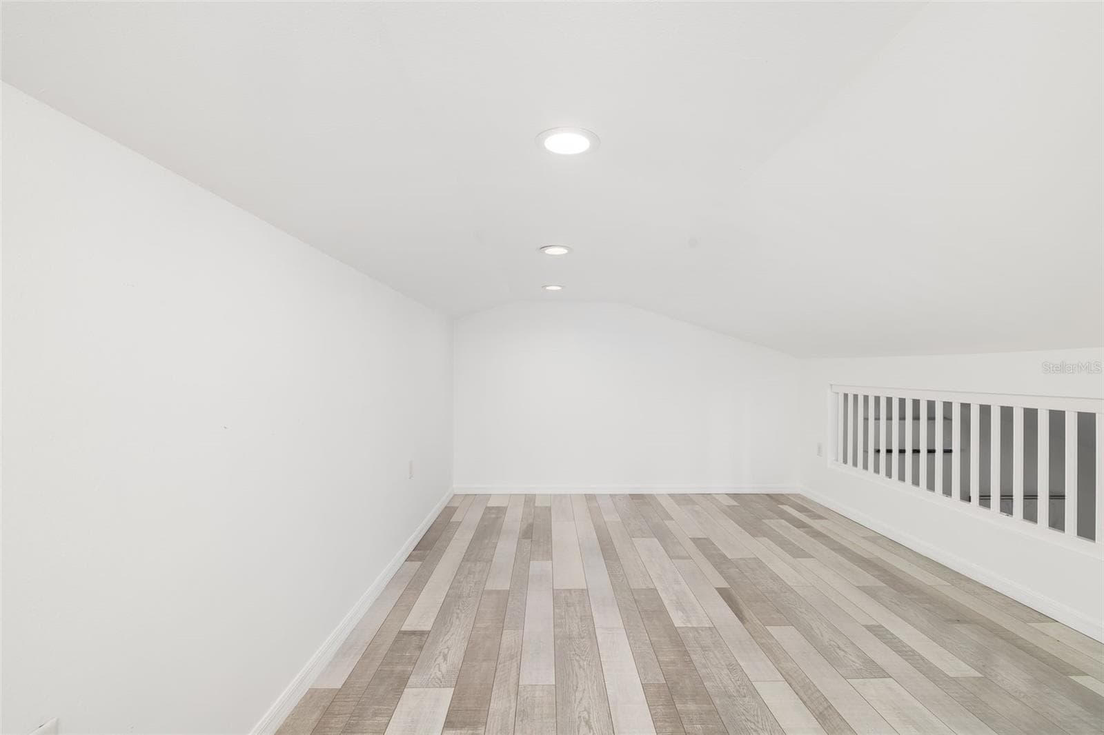 Upper loft/flex space adds even more possibilities for a home office, hobby area, reading retreat, storage or additional usable space. - 403 LONGBOW TRL, OSPREY