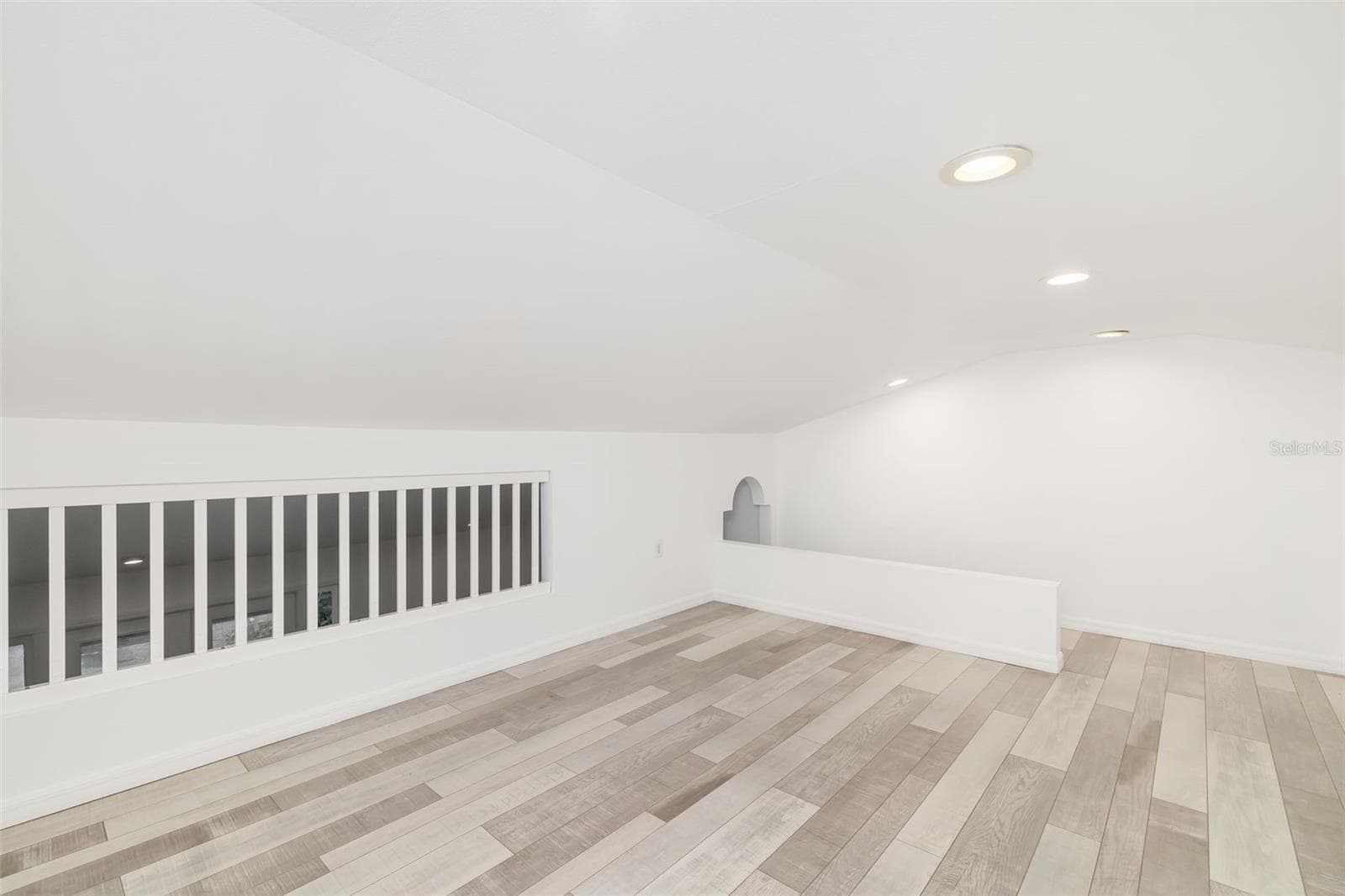Upper loft/flex space adds even more possibilities for a home office, hobby area, reading retreat, storage or additional usable space. - 403 LONGBOW TRL, OSPREY