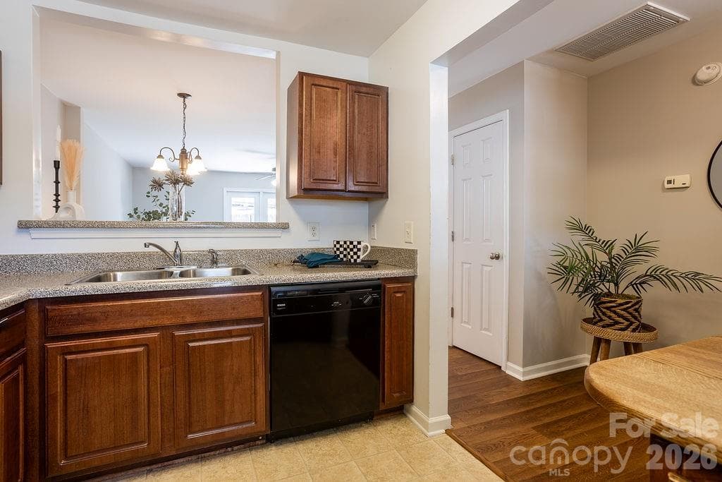 powder room on main floor for guests - 31 Amersham Lane, Fletcher