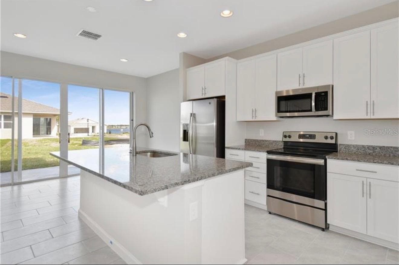 Single Family Residence at 588 LAKE SMART BLVD, WINTER HAVEN, photo 2 of 2
