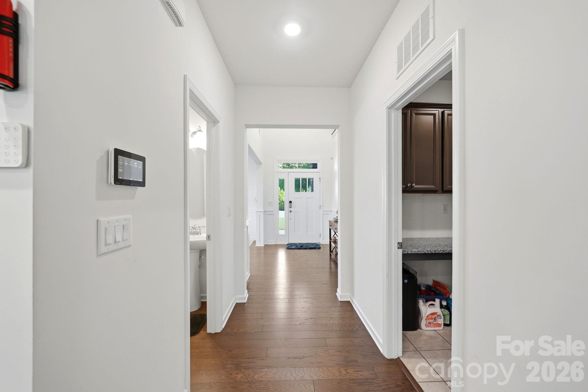 Foyer with Laundry on left and guest bathroom to right - 4603 Monument Valley Drive, Indian Land