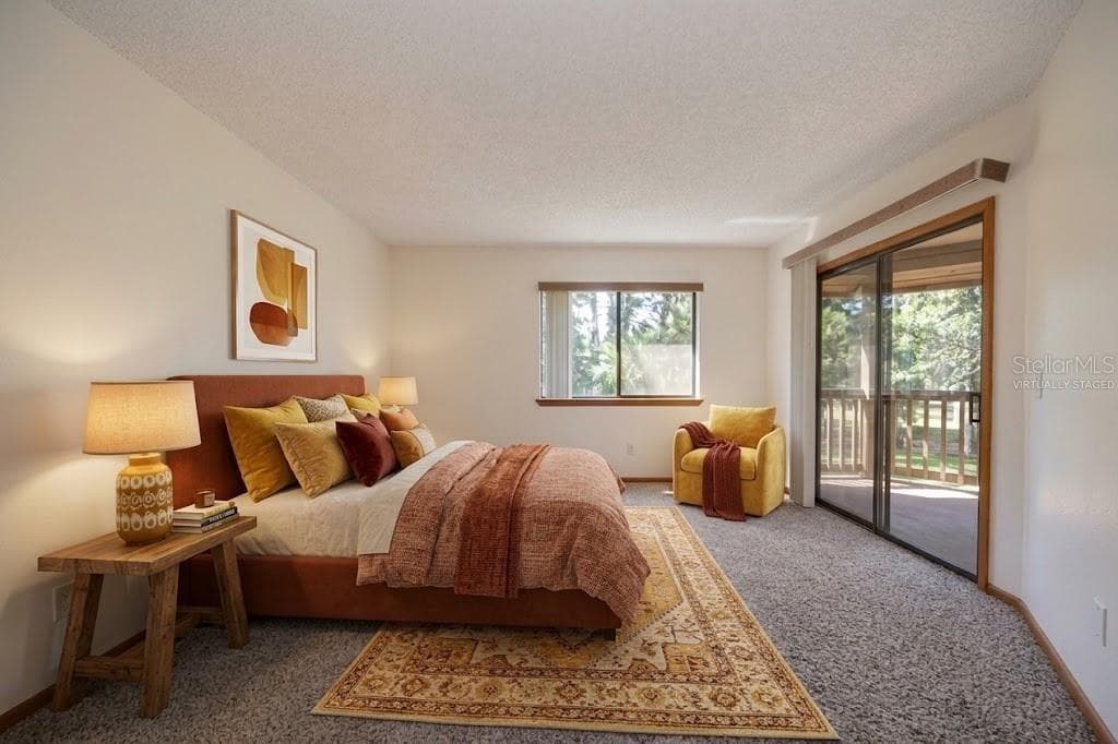 VIRTUALLY STAGED: Primary bedroom - 12 FAIRWAYS CIR #12, PALM COAST