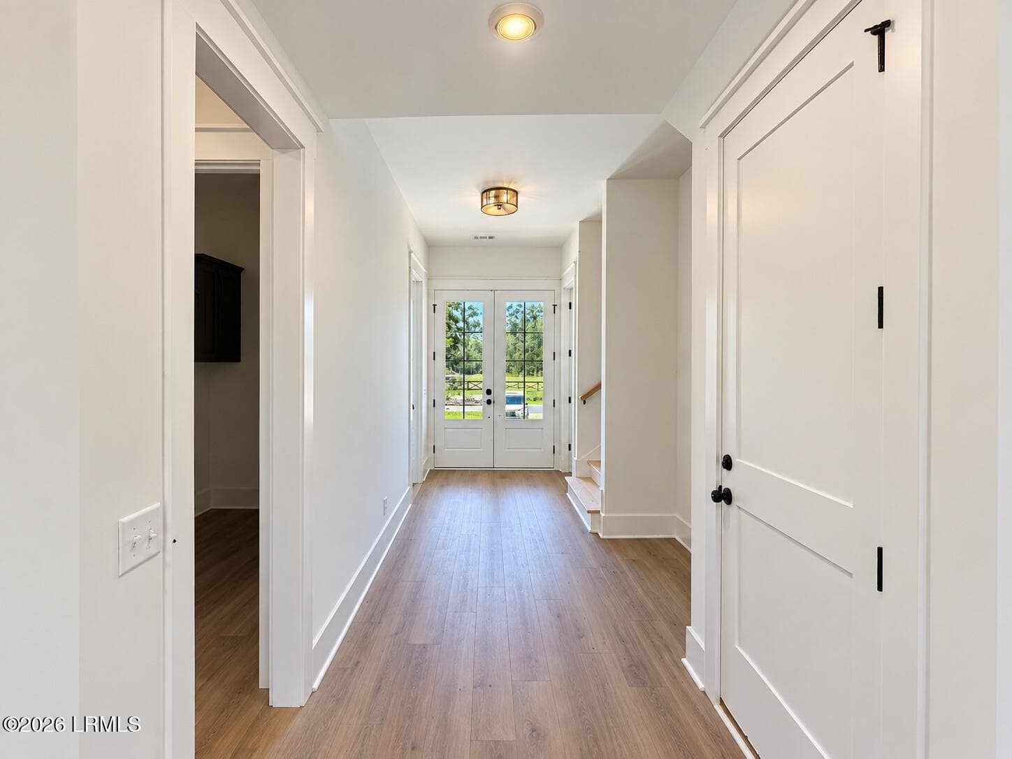 03_bright_modern_hallway_with_glass_door - 2493 Knowles Island Road, Ridgeland, SC 29936, Ridgeland