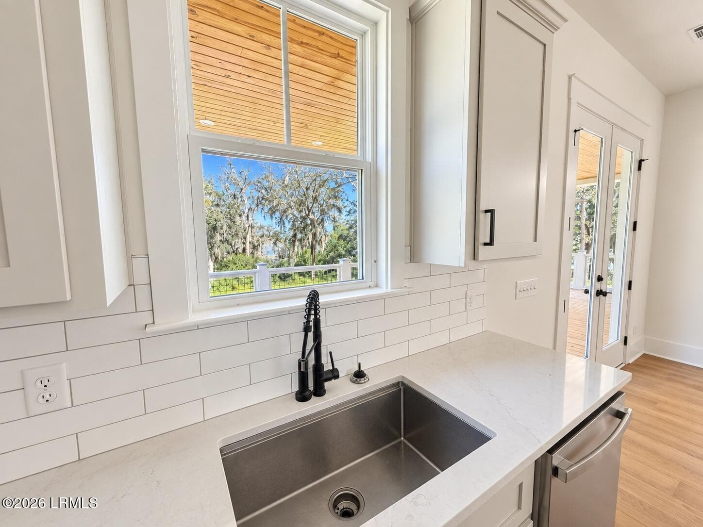 29_bright_modern_kitchen_sink_and_porch_ - 2493 Knowles Island Road, Ridgeland, SC 29936, Ridgeland