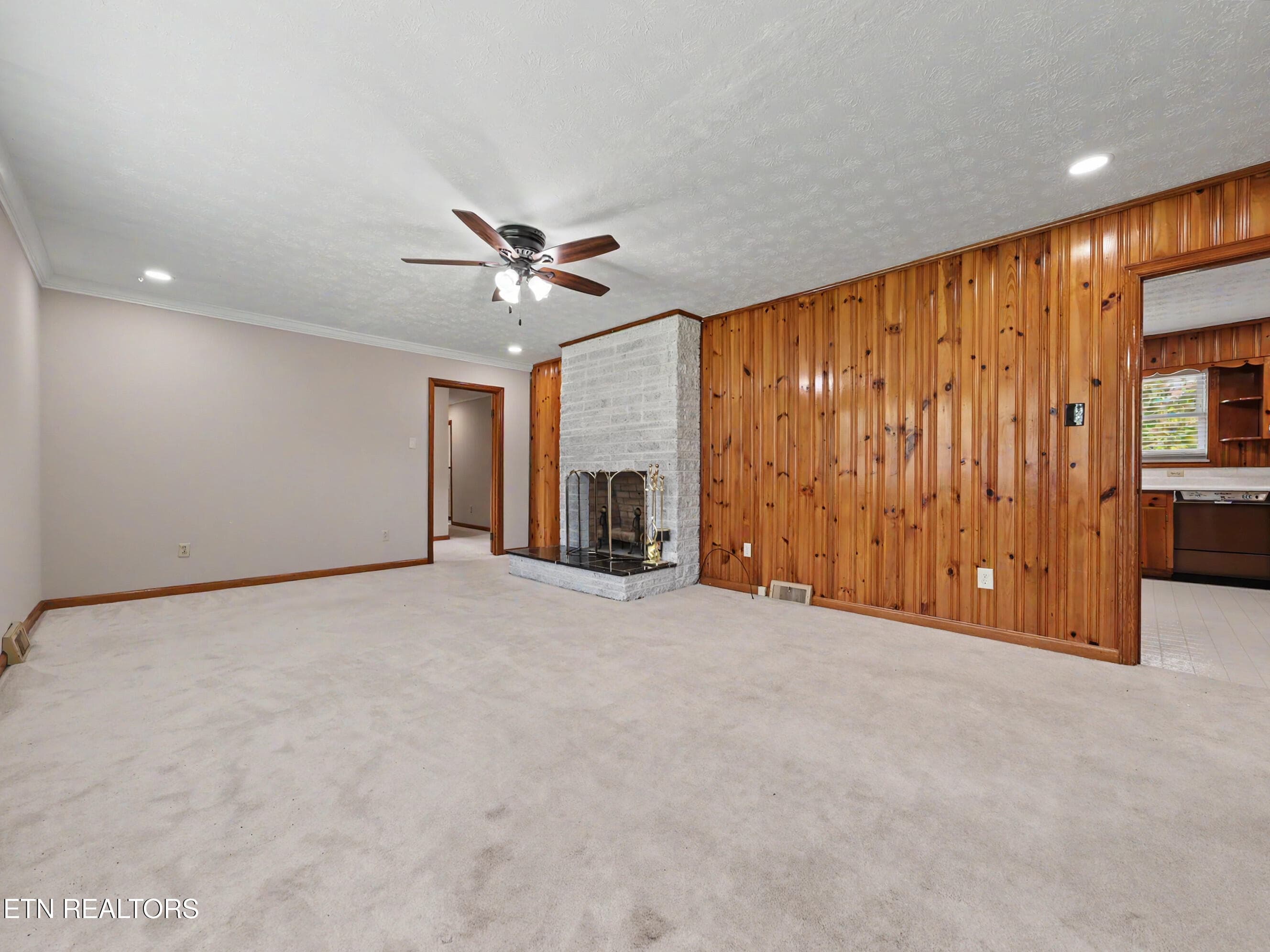 Family room w knotty pine paneling - 717 Old Glory Rd, Maryville, TN 37801
