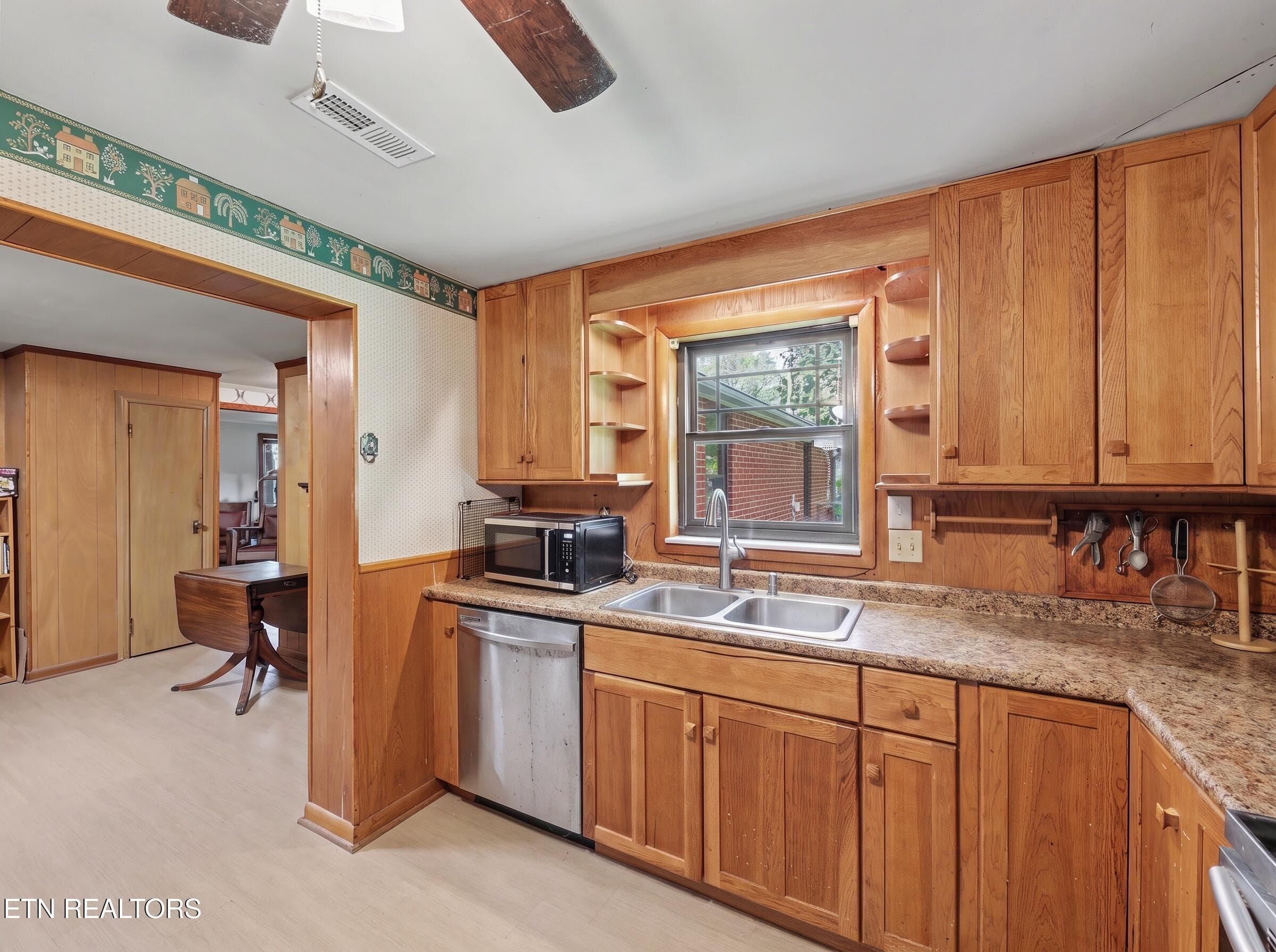 Kitchen opening to dining - 134 Hodges Lane, Maryville, TN 37804
