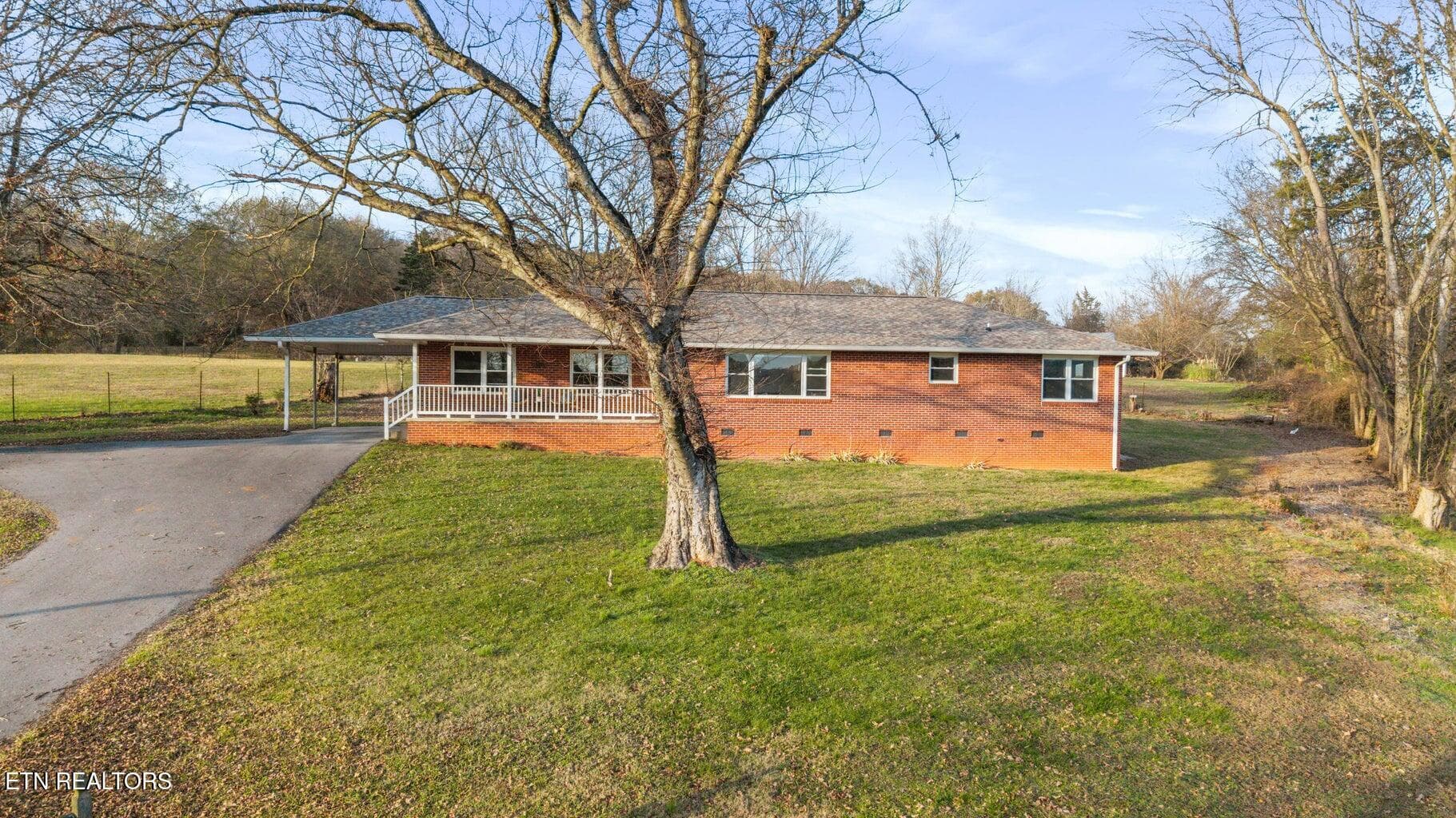 128 Scott St- Front - 128 NE Scott St, Charleston, TN 37310
