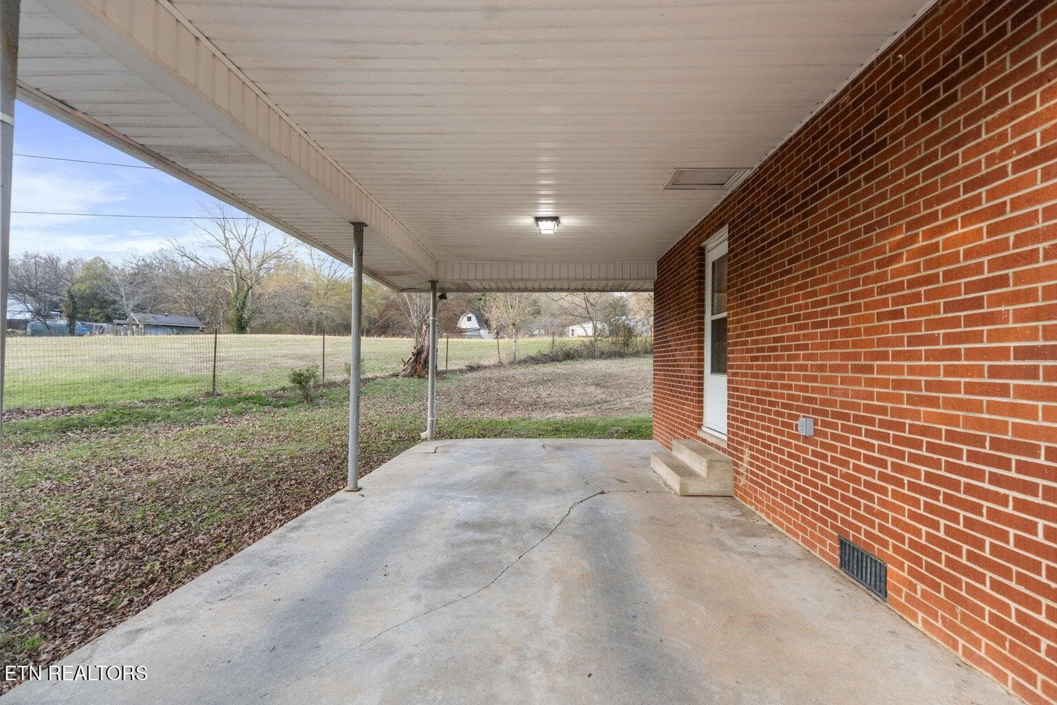 Carport - 128 NE Scott St, Charleston, TN 37310