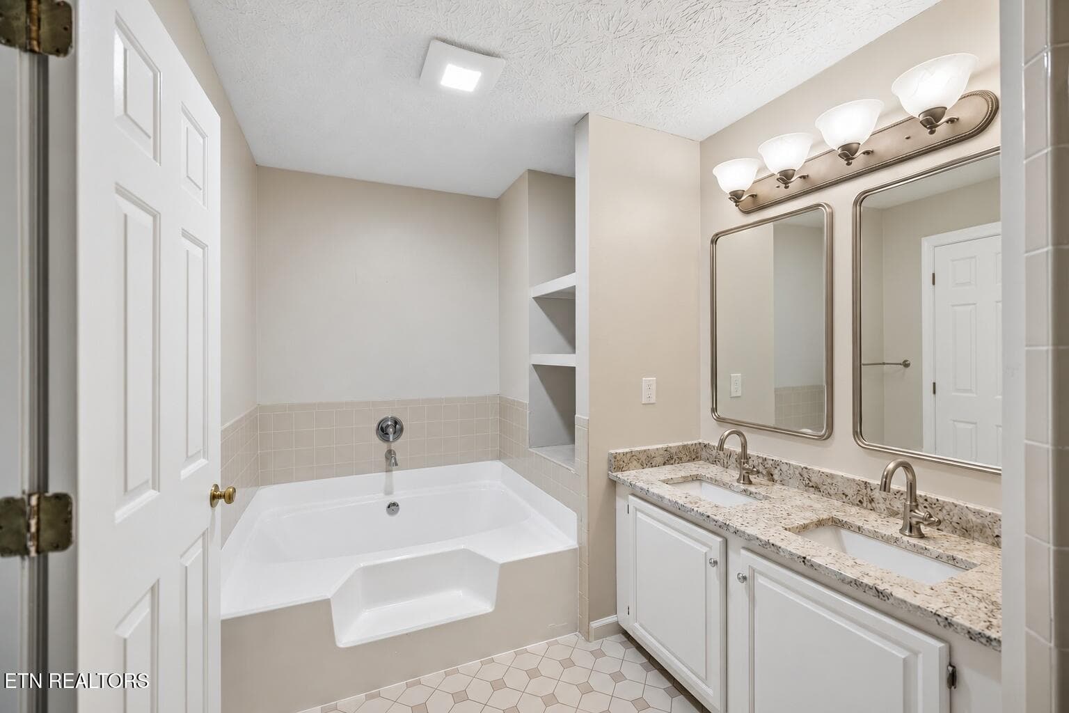 bathroom_with_polished_nickel_mirrors - 1125 Greywood Drive, Knoxville, TN 37923, Knoxville