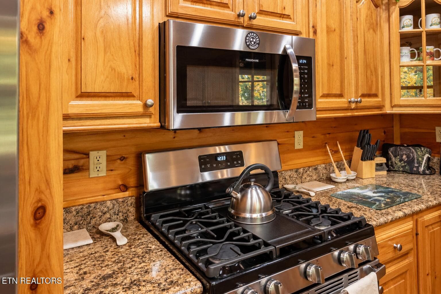 Warm Rustic Cabin Kitchen Stove Corner - 3341 Sugar Maple Loop Rd, Sevierville, TN 37862