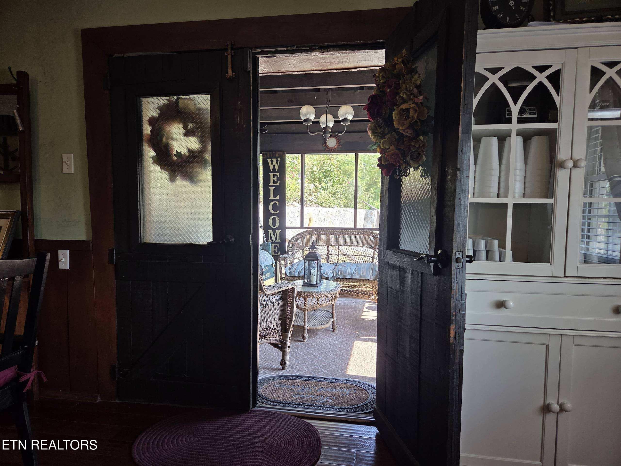 antique doors to screened patio - 572 Mountain Rd, Clinton, TN 37716, Clinton