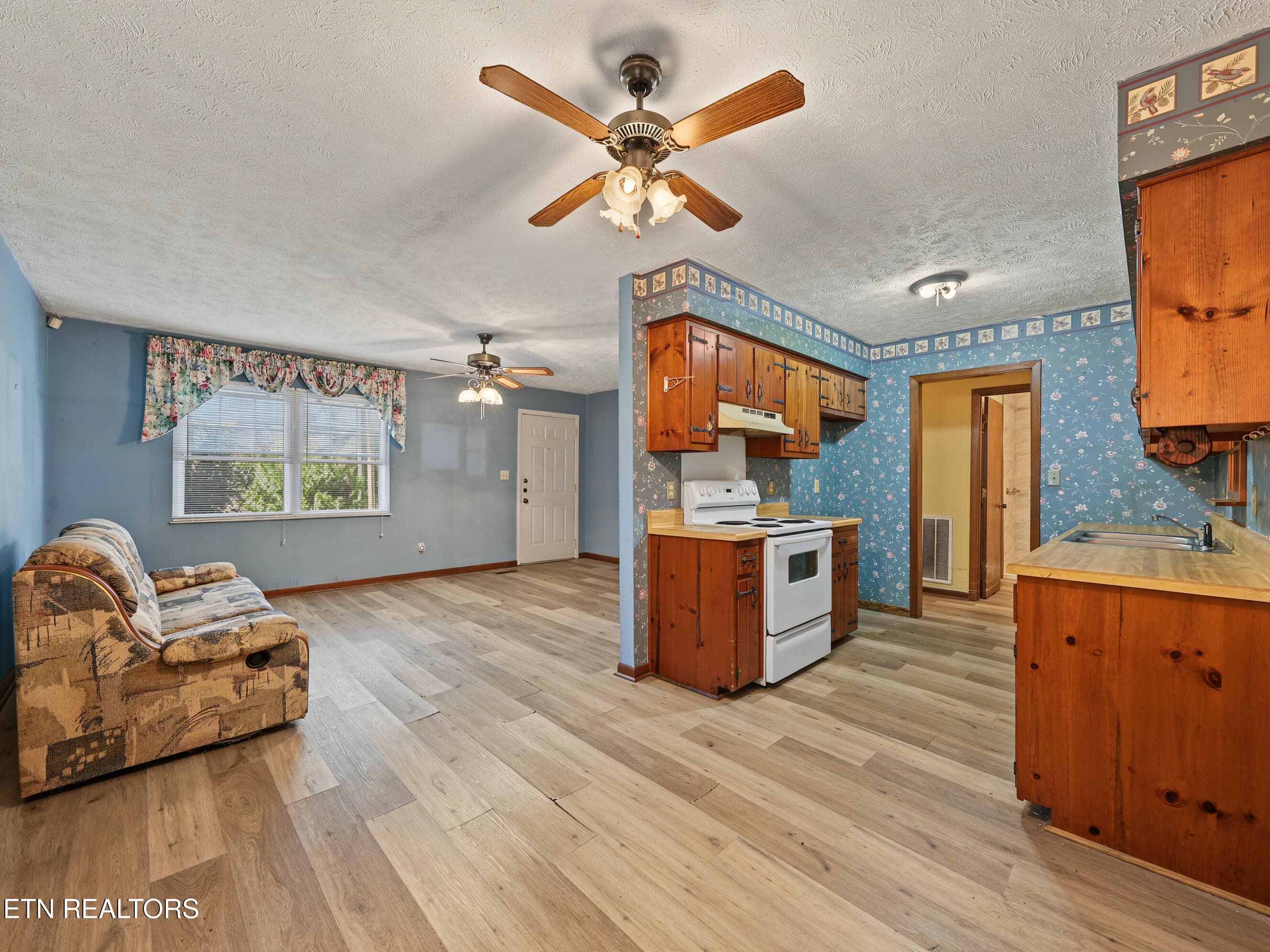 Looking at family room and kitchen - 911 Michelle Drive, Friendsville, TN 37737, Friendsville