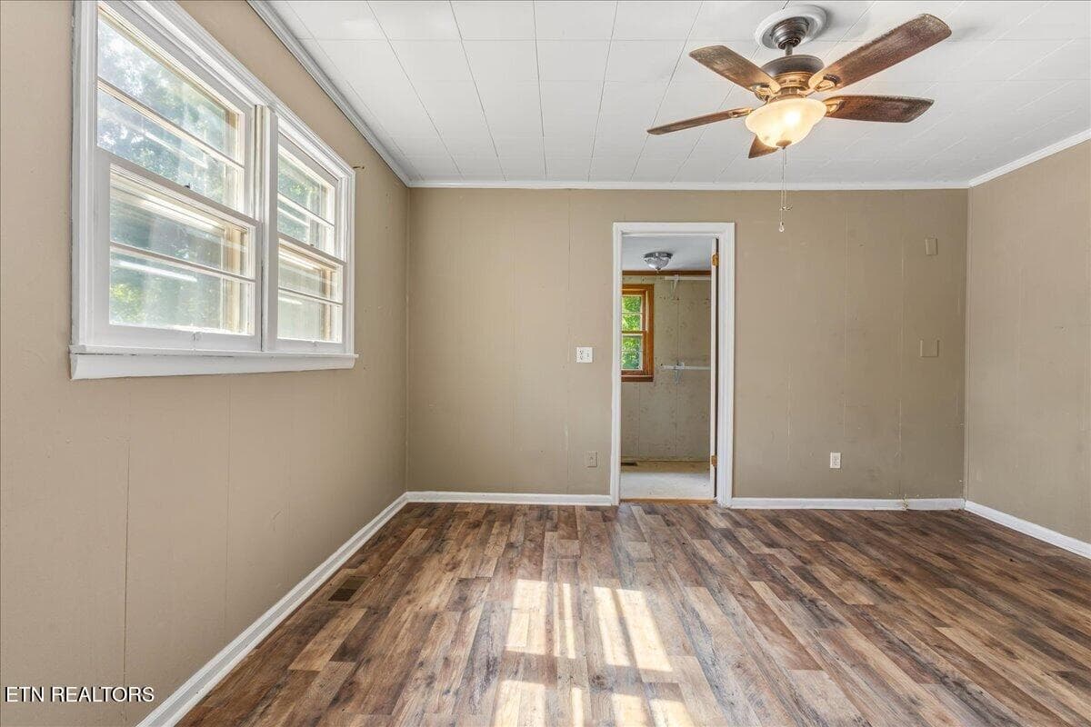 Primary bedroom with wood-look flooring - 139 County Road 532, Etowah, TN 37331, Etowah