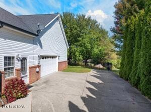 Garage and door leading to bonus room - 1957 Lakebrook Circle, Dandridge, TN 37725, Dandridge