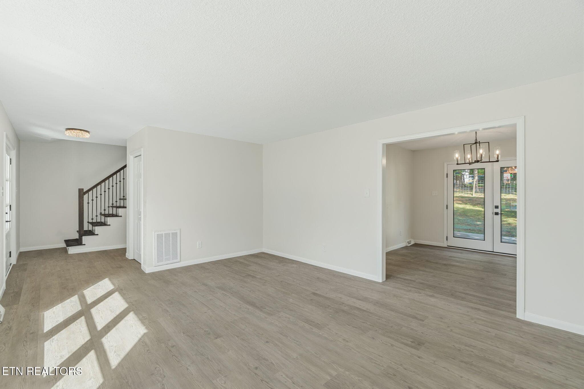 PEAK INTO THE FORMAL DINING ROOM - 3923 Glen Oaks Drive, Maryville, TN 37804, Maryville