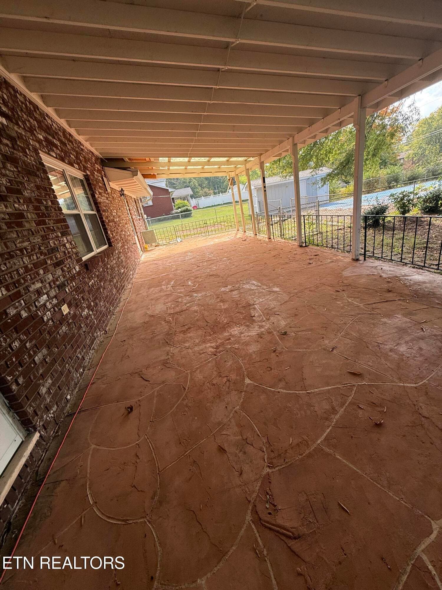 covered back porch overlooks pool - 302 Jackson Hills Drive, Maryville, TN 37804, Maryville