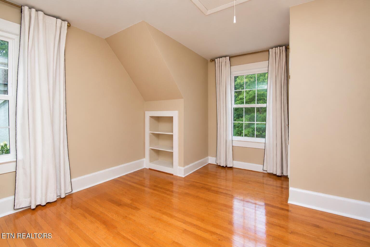 Empty Attic Bedroom with Built-In Shelvi - 6809 Nubbin Ridge Drive, Knoxville, TN 37919
