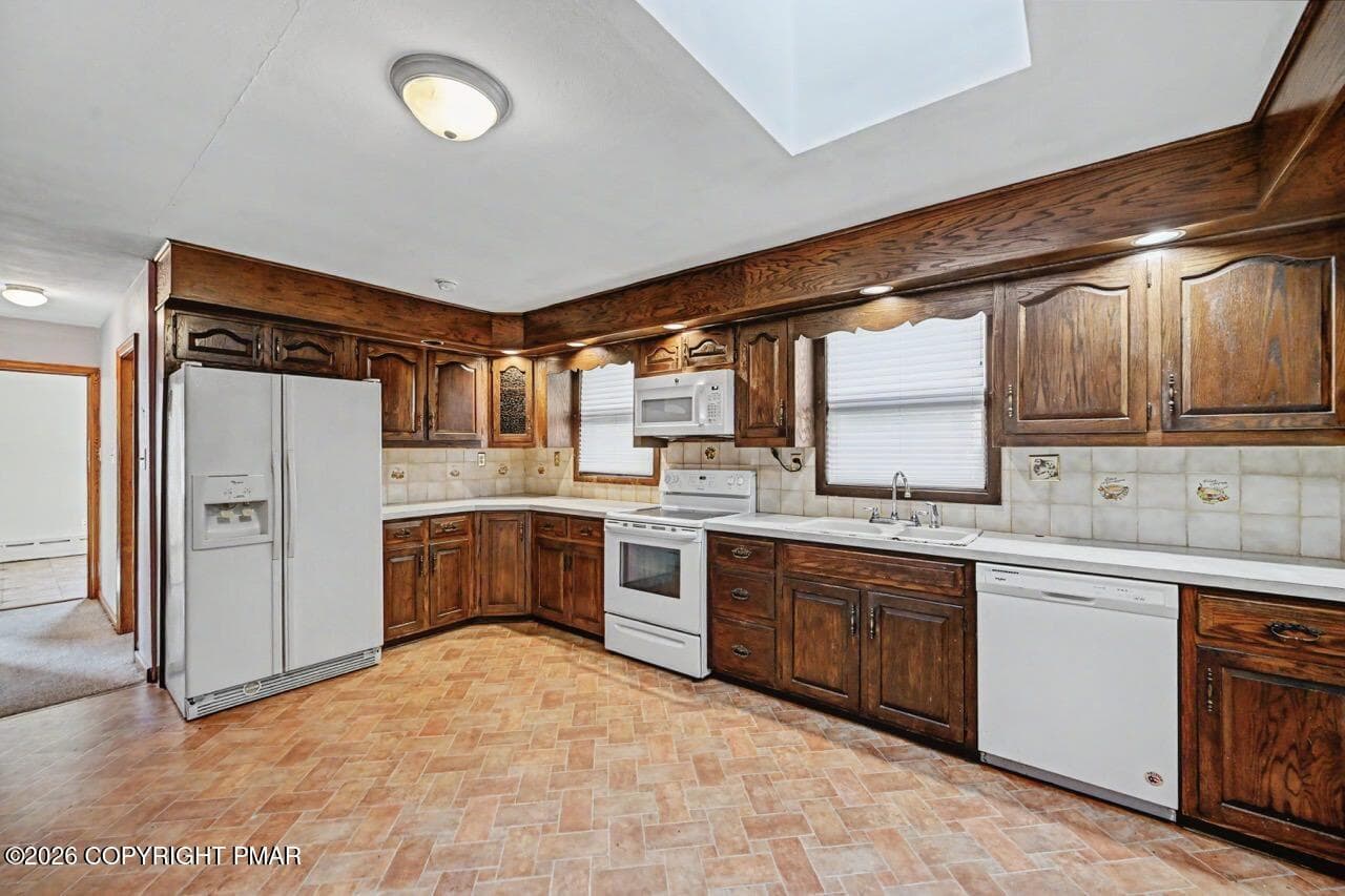Kitchen w/ Abundant Wooden Cabinetry - 2367 Route 209, Sciota, PA 18354, Sciota