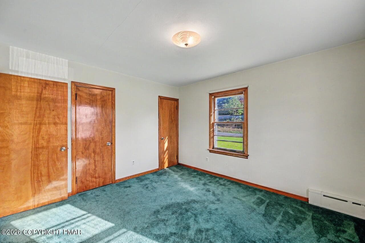 Bedroom 2 w/ Wooden Closet Doors - 2367 Route 209, Sciota, PA 18354, Sciota