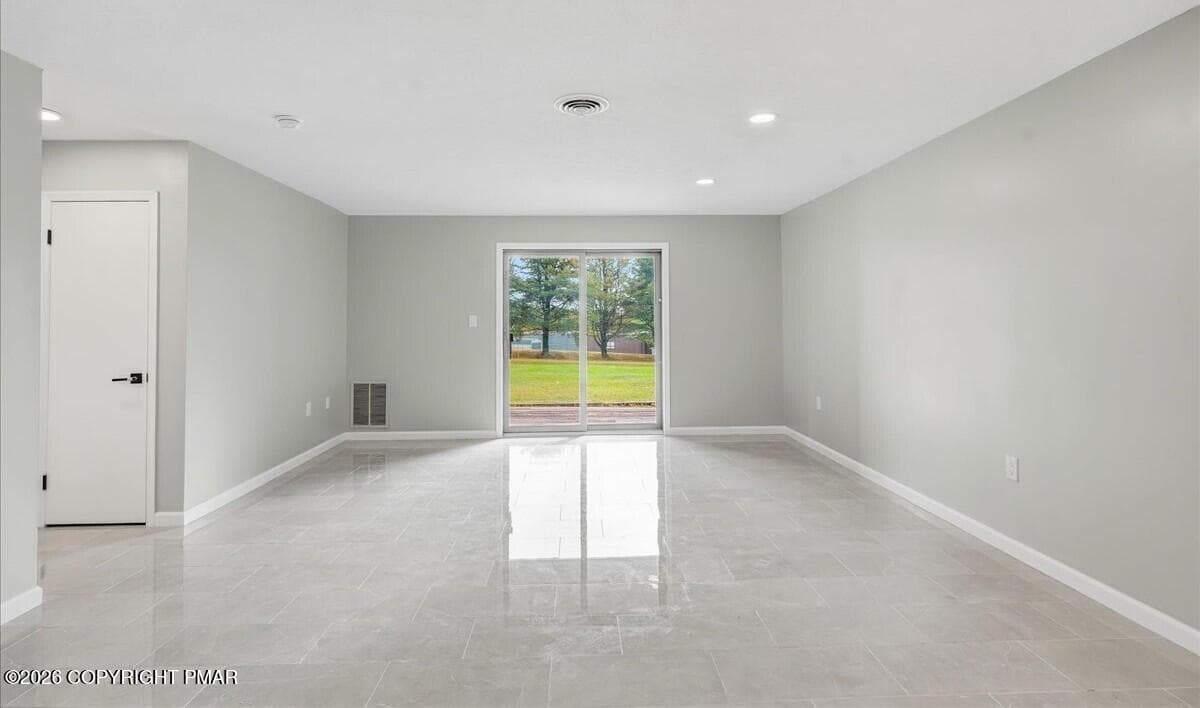 Living Room View 3 - 146 Foxfire Drive Unit 106, Mount Pocono, PA 18344, Mount Pocono