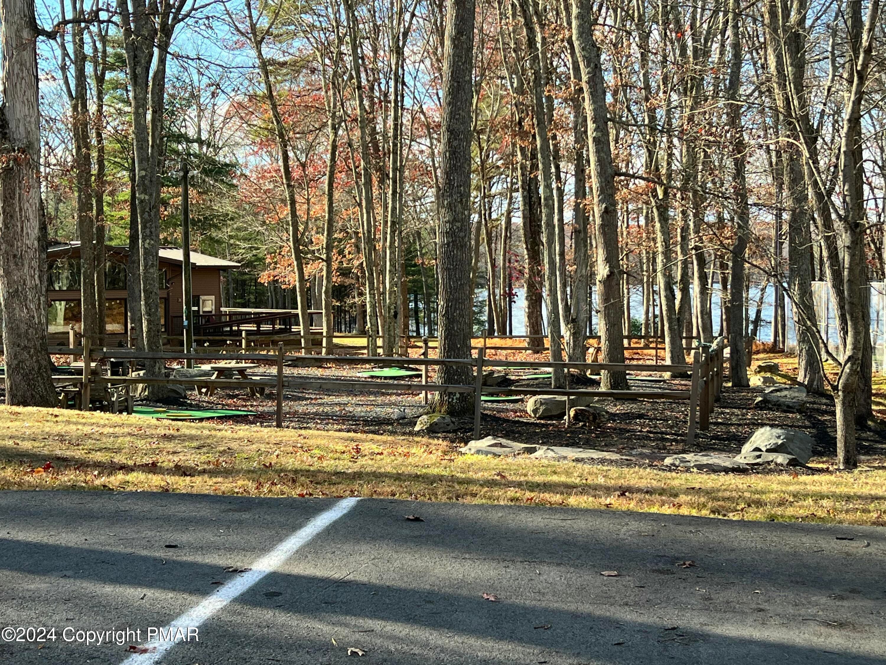clubhouse and lake - 229 Forest Ridge Drive, Hawley, PA 18428, Hawley