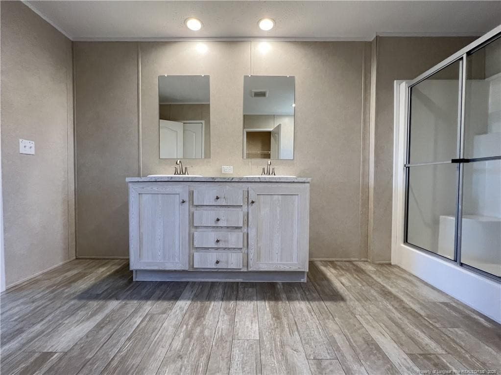 Primary bathroom view from closet - 801 Horseshoe Road, Autryville, NC 28318