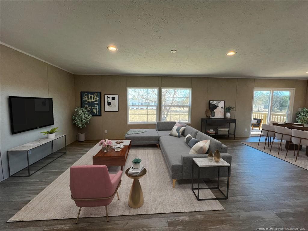 Den view with virtual staging - 801 Horseshoe Road, Autryville, NC 28318